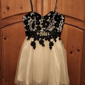 Strapless Black and champagne special occasion dress with jeweled waistline